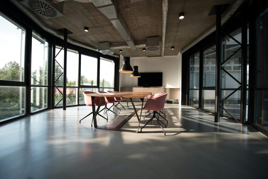 Glass-walled meeting space, architectural inspiration, not an IFM installation.