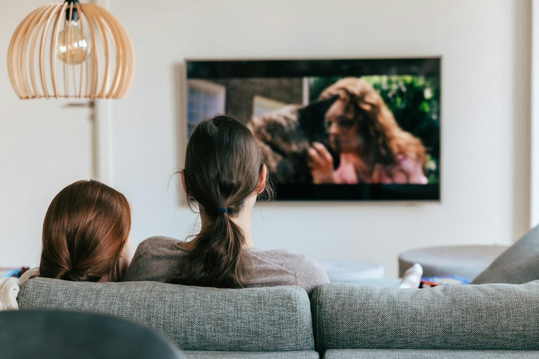 People enjoying television together at home